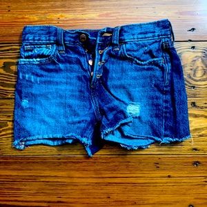 Ripped jean shorts with front and back pockets